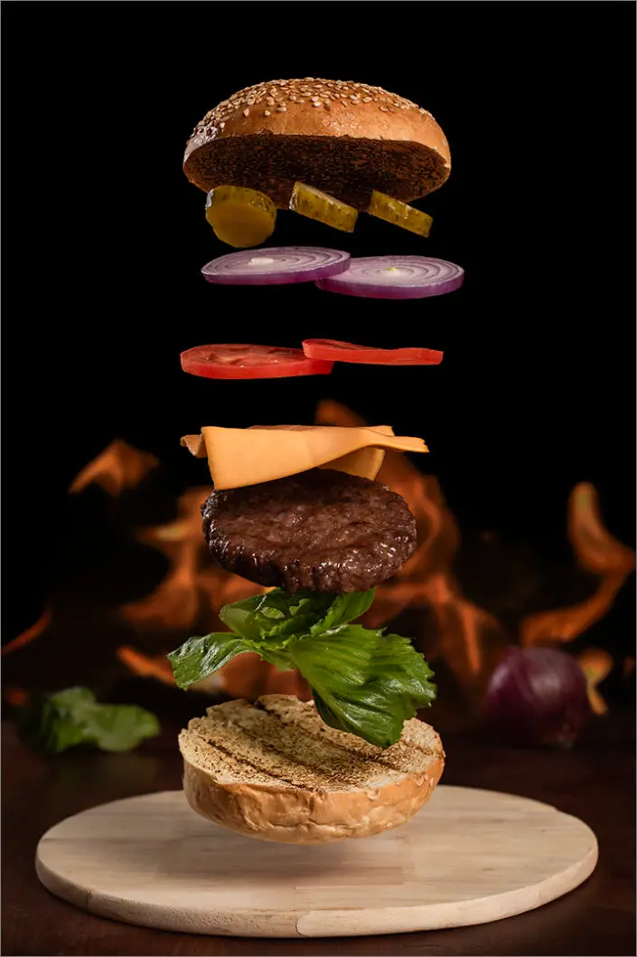 Hamburger with flying ingredients