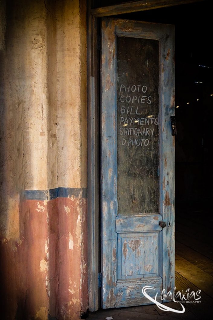 Blue door to a old stationary shop